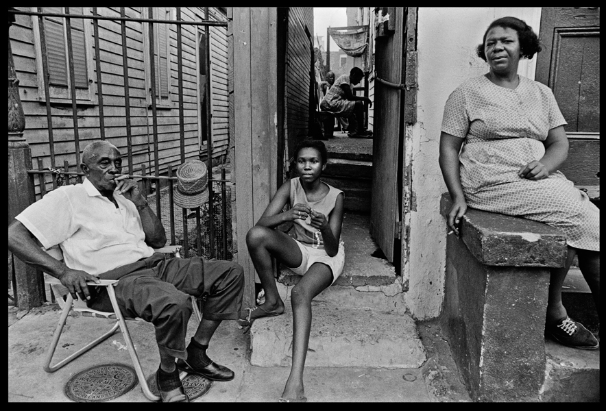 U.S.A. Louisiana. New Orleans. 1968. African-Americans resting on their porch.