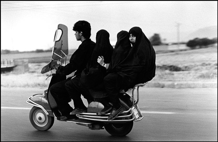 IRAN. Shahr Rey. 1997. Four seater motorbike.